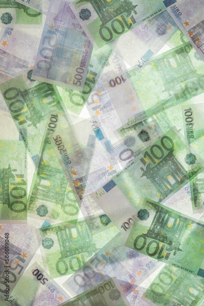 Blurred photo of one hundred and five hundred euros are defrosted in ice. The European cash currency is frozen. Blurred photo of one hundred and five hundred euros are defrosted in ice. The European cash currency is frozen.