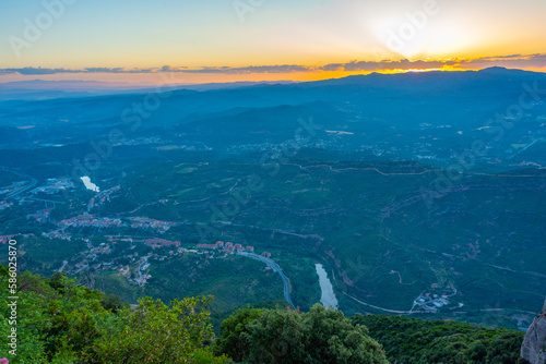 Sunrise aerial view of Monistrol de Montserrat  in Spain photo