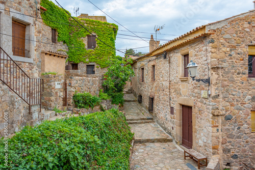 Medieval street in Spanish town Tossa de Mar photo