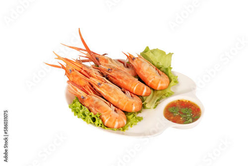 grilled shrimp on a plate served with spicy sauce