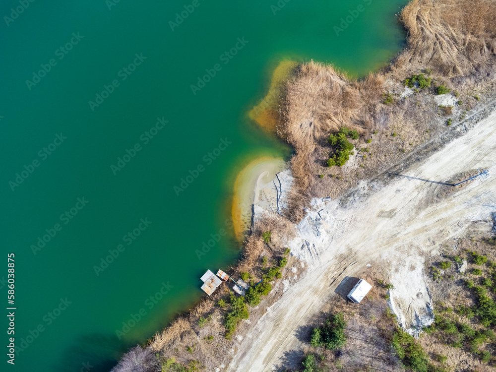 Aerial view landscape. Green water, sand, empty space, deserted beach.
