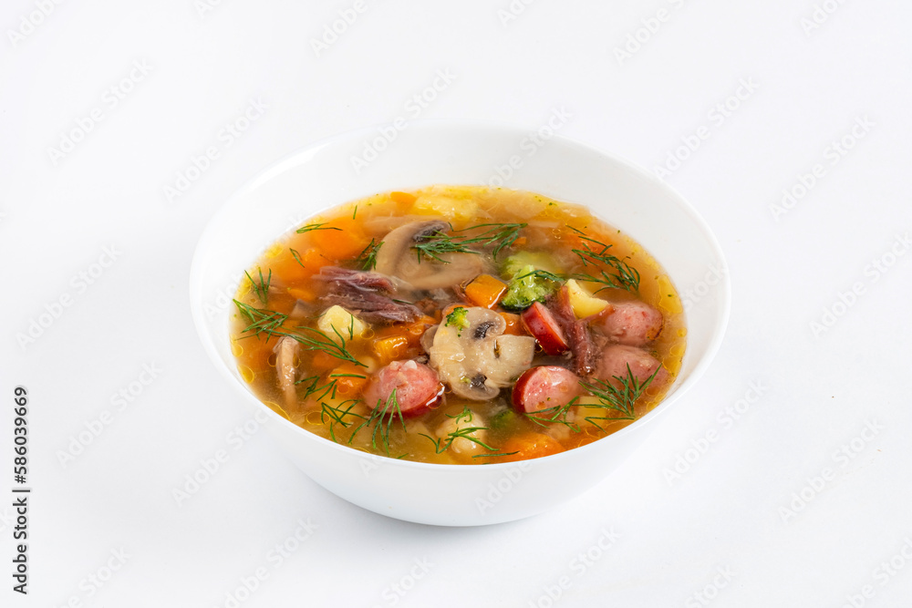 pot-au-feu vegetables sausage soup on the white pot-au-feu vegetables sausage soup on the white