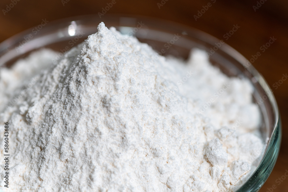 bowl of flour dough on a wooden surface. Cooking bread. Kneading the Dough. Long banner format bowl of flour dough on a wooden surface. Cooking bread. Kneading the Dough. Long banner format