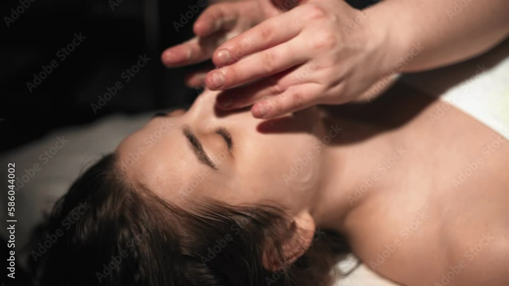 Cosmetologist applying cleansing foam on woman's face skin Cosmetologist applying cleansing foam on woman's face skin