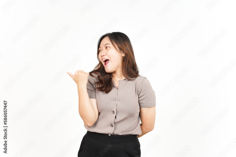 Presenting and Pointing Side Product Using Thumb Of Beautiful Asian Woman Isolated On White Presenting and Pointing Side Product Using Thumb Of Beautiful Asian Woman Isolated On White