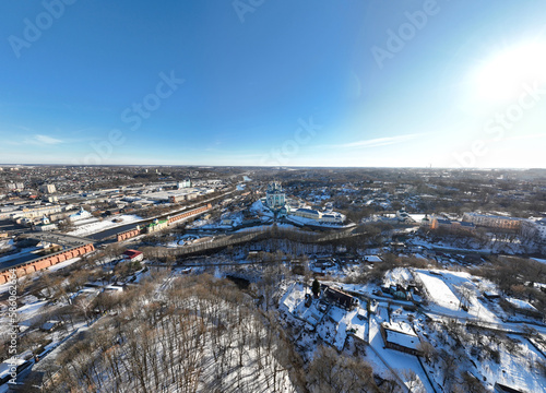 panoramic view from a drone of the historical part of Smolensk with a fortress wall and churches on a sunny winter day