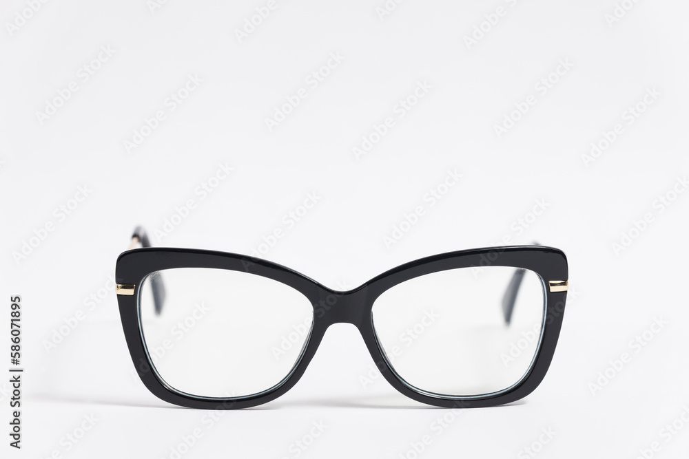 Black female eyeglasses isolated on white background close-up, fashionable trendy stylish accessory. Black female eyeglasses isolated on white background close-up, fashionable trendy stylish accessory.