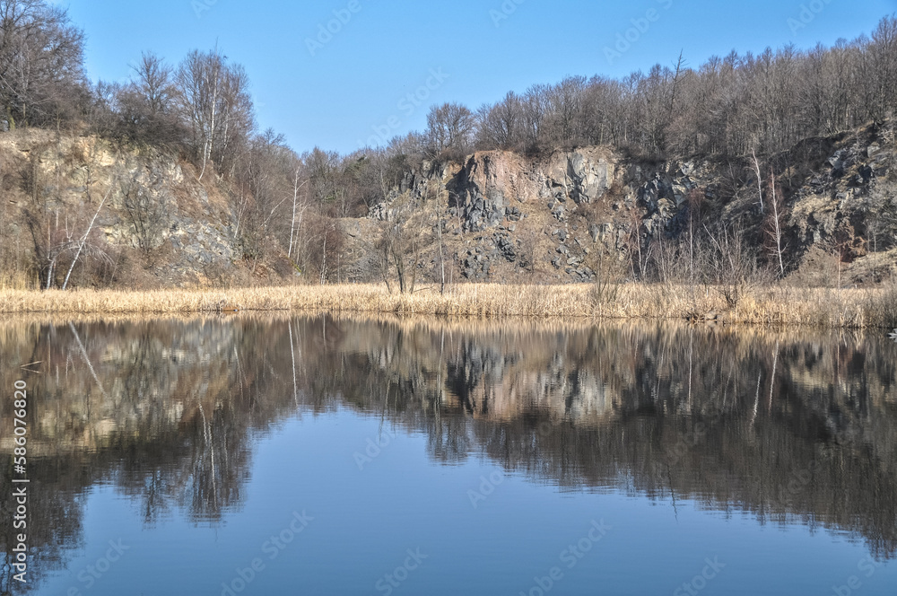 old abandoned stone quarry basalt mine flooded with water