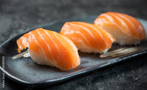 Raw salmon sushi on a plate 