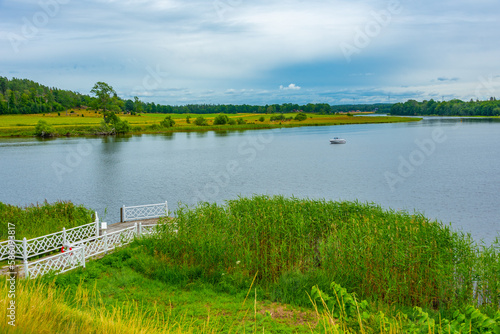 Lake at Stjernsund Castle viewed during a cloudy day in Sweden photo