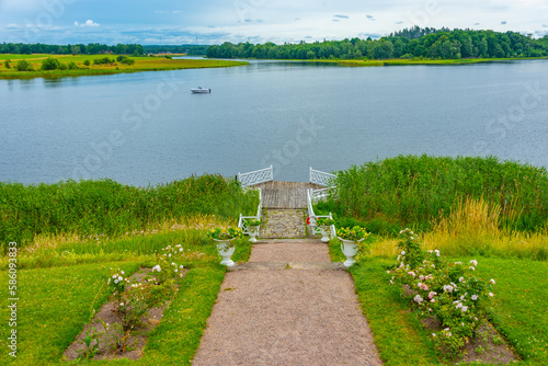 Lake at Stjernsund Castle viewed during a cloudy day in Sweden photo