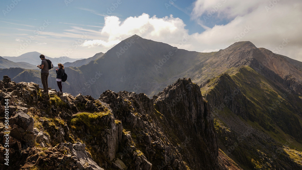 Snowdon mountain in the Snowdonia National Park in Gwynedd, Wales, UK. Snowdon mountain in the Snowdonia National Park in Gwynedd, Wales, UK.