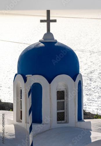 Blue dome of  greek orthodox Christian church in Oia. Santorini, Greece photo