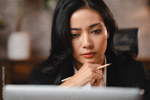 professional businesswoman entrepreneur working in confident to corporate business with online cyberspace technology, Asian woman using laptop computer on desk office, businessperson job to successful