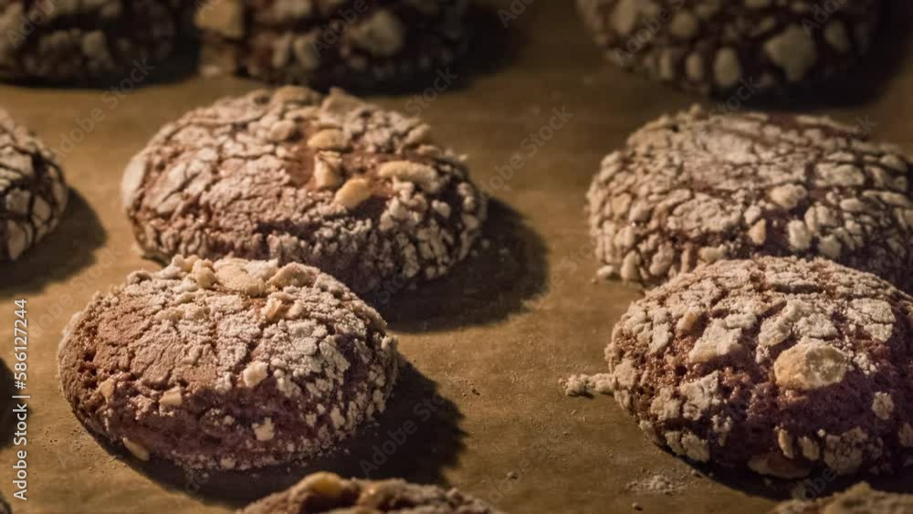 Close up of chocolate cookies baking in the oven on high temperature. Christmas treat for Santa Claus Close up of chocolate cookies baking in the oven on high temperature. Christmas treat for Santa Claus