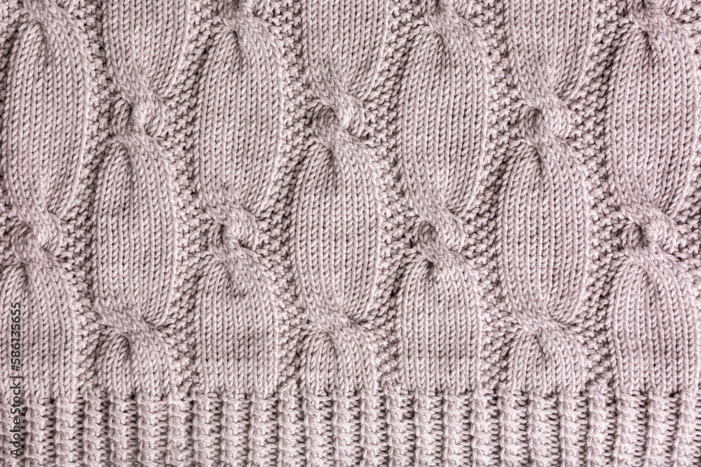 Background with knitting pattern for sweater with cables. Above overhead shot