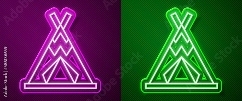 Glowing neon line Traditional indian teepee or wigwam icon isolated on purple and green background. Indian tent. Vector