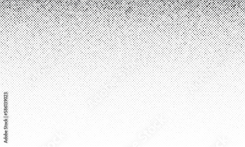 Abstract dot halftone background. Gray dots with random size in seamless design.