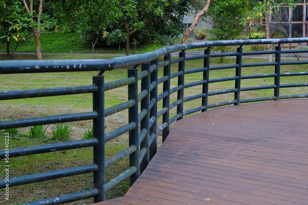 Guardrail for safety on a bridge in a public park. Guardrail for safety on a bridge in a public park.
