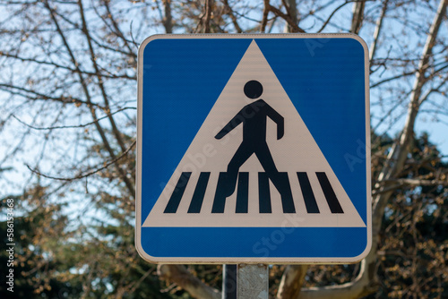 Traffic sign indicates zebra or pedestrian crossing