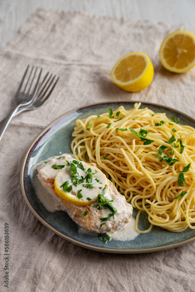 Homemade Creamy Lemon Chicken in a Pan, side view.