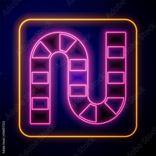 Glowing neon Board game icon isolated on black background. Vector