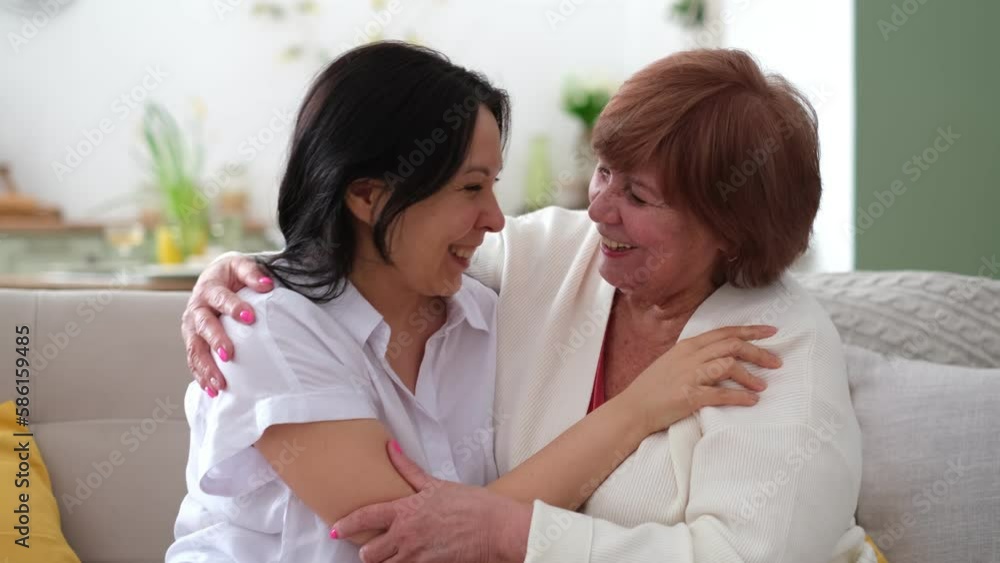 happy elderly mother chatting with her smiling middle-aged daughter. positive impact of social connections on mental health, particularly for older adults combating loneliness and depression. happy elderly mother chatting with her smiling middle-aged daughter. positive impact of social connections on mental health, particularly for older adults combating loneliness and depression.