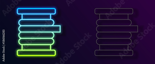 Glowing neon line Wire electric cable on a reel or drum icon isolated on black background. Vector