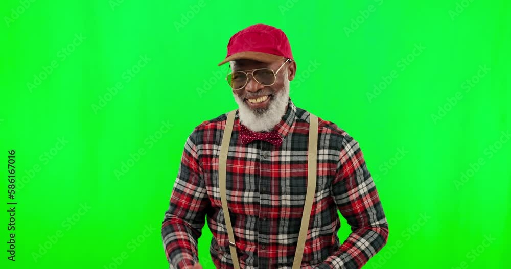 Dance, music and a senior black man on a green screen background in studio having fun moving with rhythm. Party, fashion and funky with a happy elderly man dancing on chromakey mockup for freedom Dance, music and a senior black man on a green screen background in studio having fun moving with rhythm. Party, fashion and funky with a happy elderly man dancing on chromakey mockup for freedom