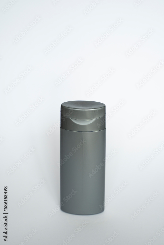 Black shampoo packaging mockup. Vertical empty plastic cosmetic package for man, isolated on white background. Container of conditioner, hair rinse. Black shampoo packaging mockup. Vertical empty plastic cosmetic package for man, isolated on white background. Container of conditioner, hair rinse.