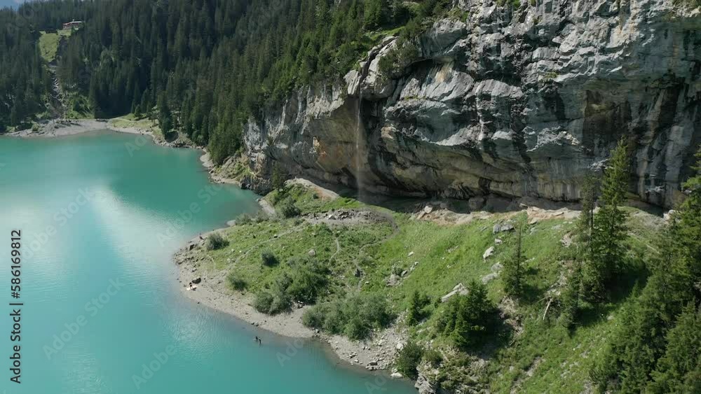 Oeschinensee lake in Swiss alps aerial view summer Oeschinensee lake in Swiss alps aerial view summer