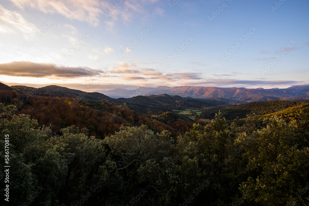 Autumn sunrise in the top of mountain in La Garrotxa, Spain Autumn sunrise in the top of mountain in La Garrotxa, Spain