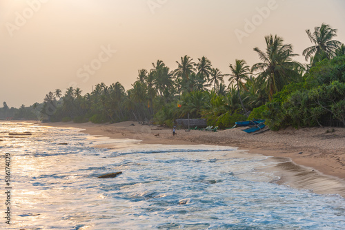 Sunset view of Marakolliya beach at Sri Lanka photo