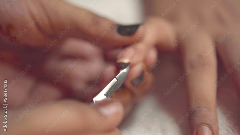 Pedicure Beautician Cutting And Shaping Fingernails With Scissors Pedicure Beautician Cutting And Shaping Fingernails With Scissors