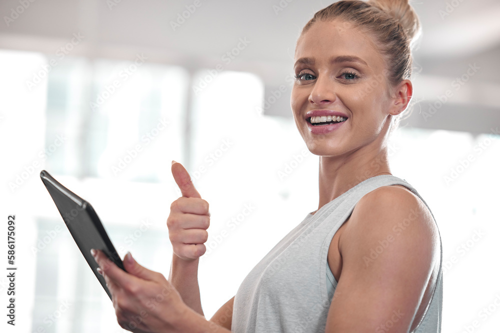 Tablet, fitness woman portrait and thumbs up of a happy female in a gym with training exercise app. Yes, agreement and motivation hand gesture of a personal trainer with a smile while checking data