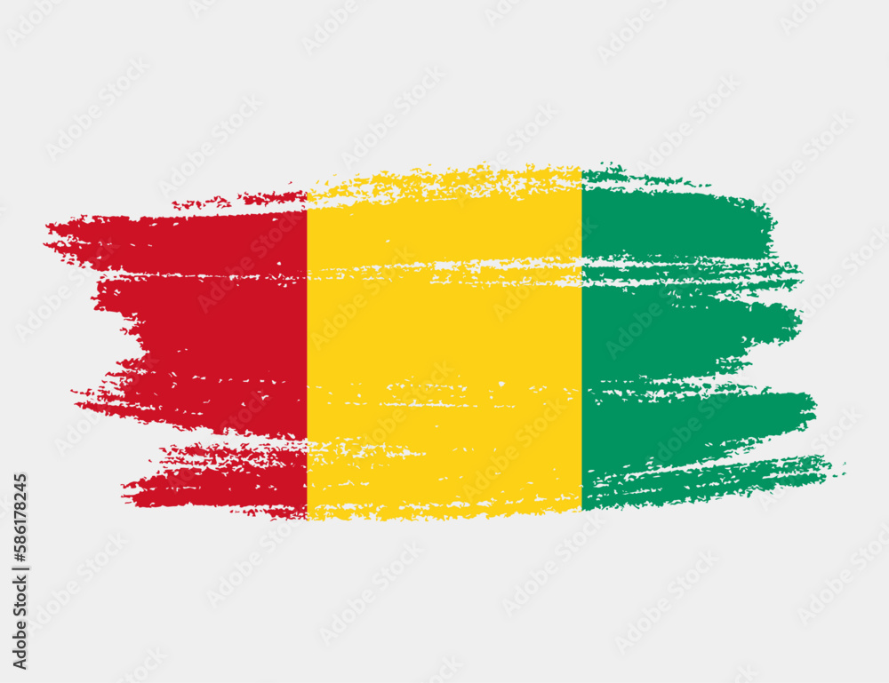 Obraz premium Artistic grunge brush flag of Guinea isolated on white background. Elegant texture of national country flag
