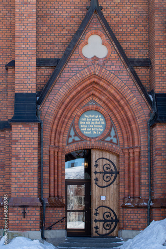 Umea City Church in winter sunny day with blue skies, Sweden photo