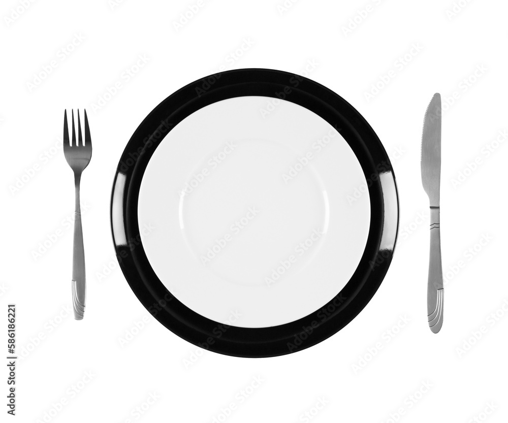 two-stacked-black-and-white-plates-with-fork-and-knife-overhead-top
