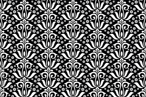 Wallpaper in the style of Baroque. Seamless vector background. White and black floral ornament. Graphic pattern for fabric, wallpaper, packaging. Ornate Damask flower ornament
