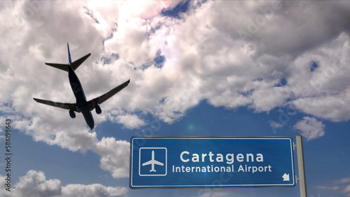 Plane landing in Cartagena airport with signboard