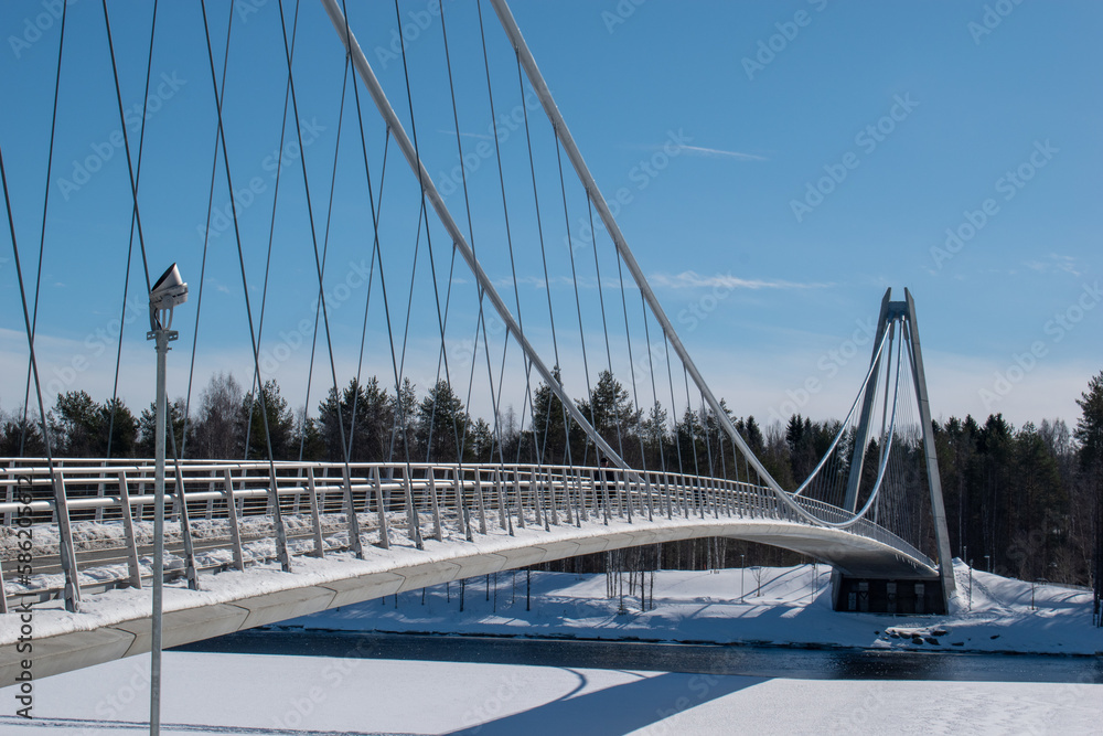 Umea, Norrland Sweden - March 26, 2023: the Lundabron on a sunny winter day. By the Umea River.