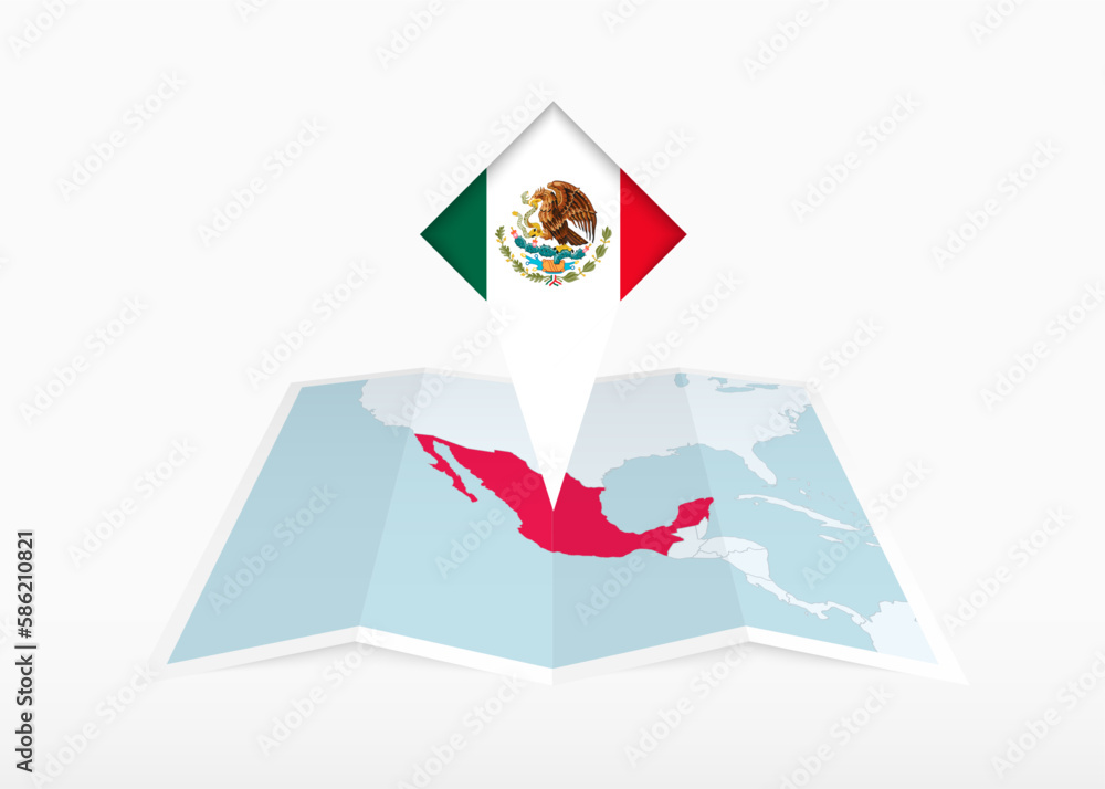 Fototapeta premium Mexico is depicted on a folded paper map and pinned location marker with flag of Mexico.