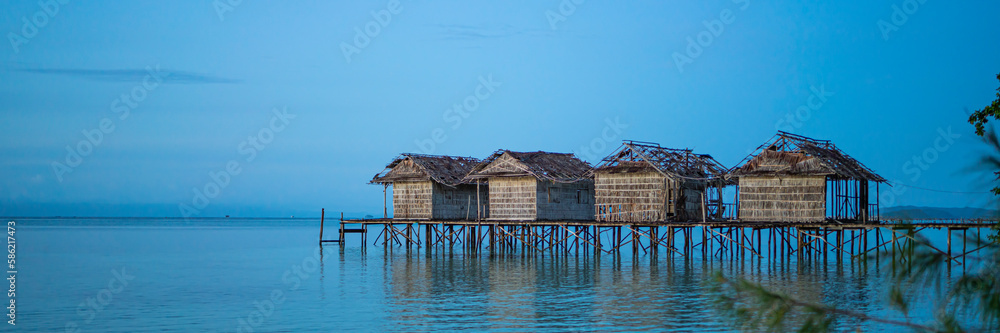 Old water houses at the coastline of Saporkren on Waisai island, Raja Ampat