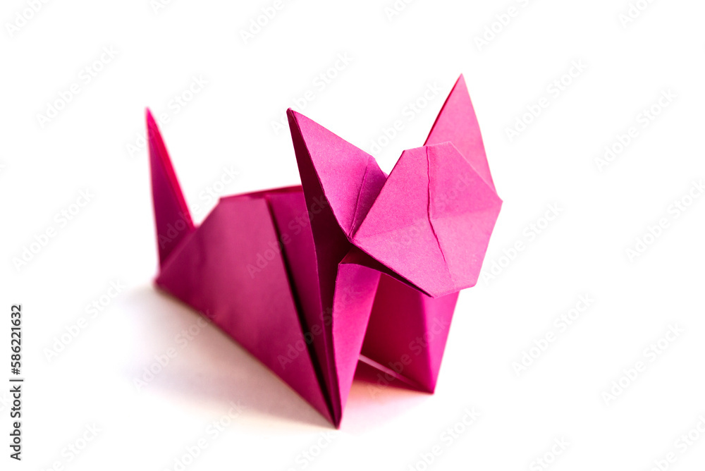 Pink paper cat origami isolated on a white background Pink paper cat origami isolated on a white background