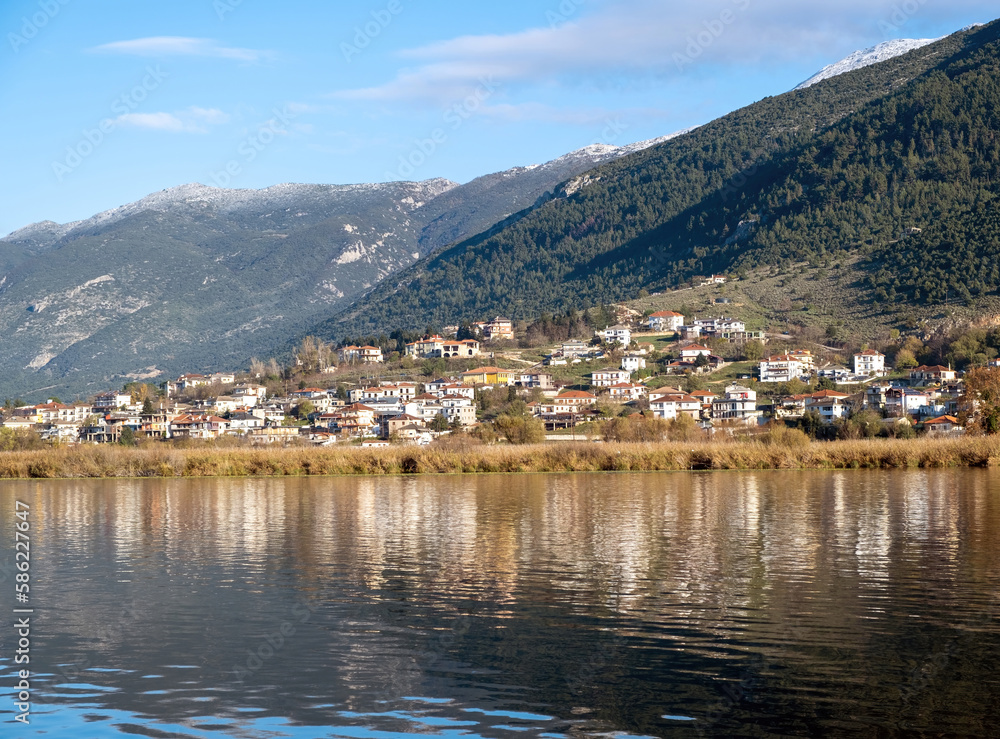Ioannina city Pamvotis Lake, Epirus Greece. Destination Giannena, blue sky background.