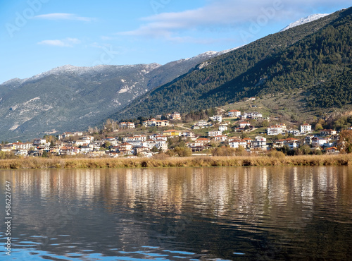 Ioannina city Pamvotis Lake, Epirus Greece. Destination Giannena, blue sky background. © Rawf8