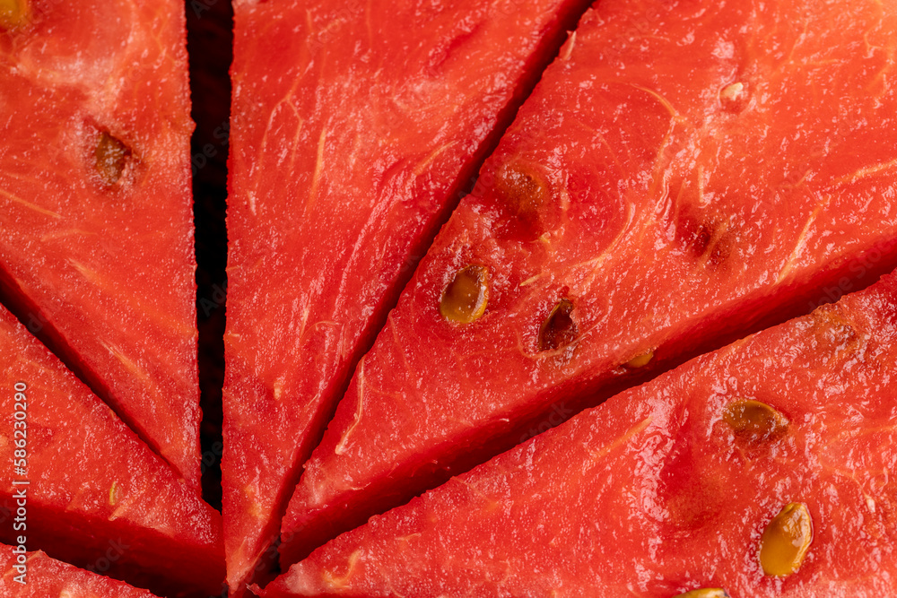 red watermelon cut into pieces on the table red watermelon cut into pieces on the table