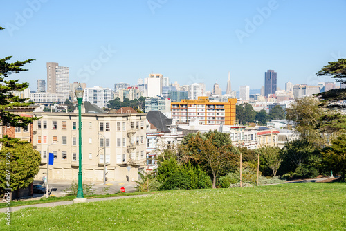 View of a urban skyline from a a hilltop park in San Francisco on a sunny autumn day