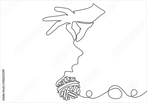 Hand holding thread ball isolated on white background.continuous stylized modern drawing