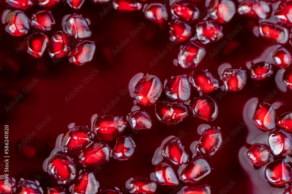 peeled red ripe pomegranate with red sweet grains peeled red ripe pomegranate with red sweet grains